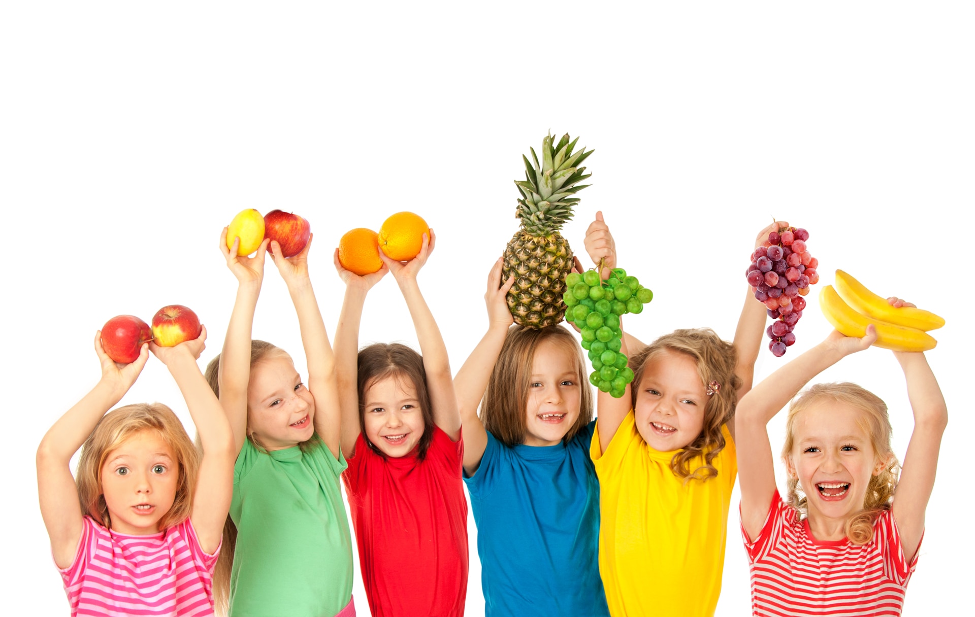 Grupo de niños con frutas en las manos - header