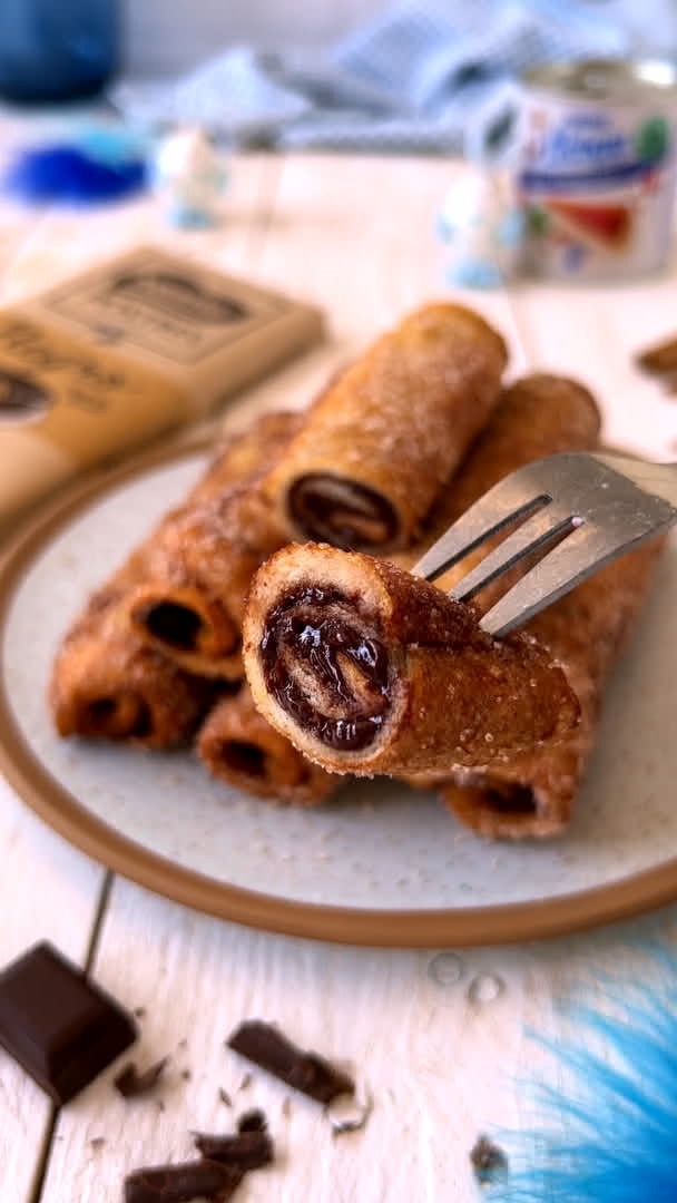 Rollos de torrijas con chocolate